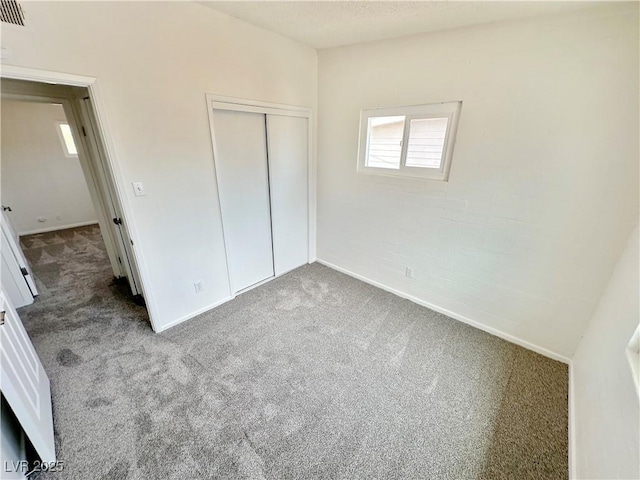 4924 Carmen Blvd, Las Vegas, NV 89108 - unfurnished bedroom with carpet and a closet
