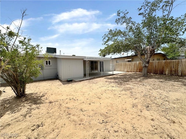 4924 Carmen Blvd, Las Vegas, NV 89108 - rear view of house with a patio area