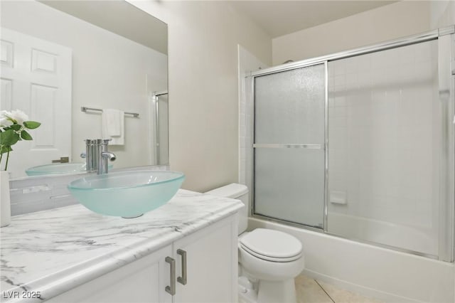 4753 Carefree Dr, Las Vegas, NV 89122 - bathroom featuring vanity and bath / shower combo with glass door