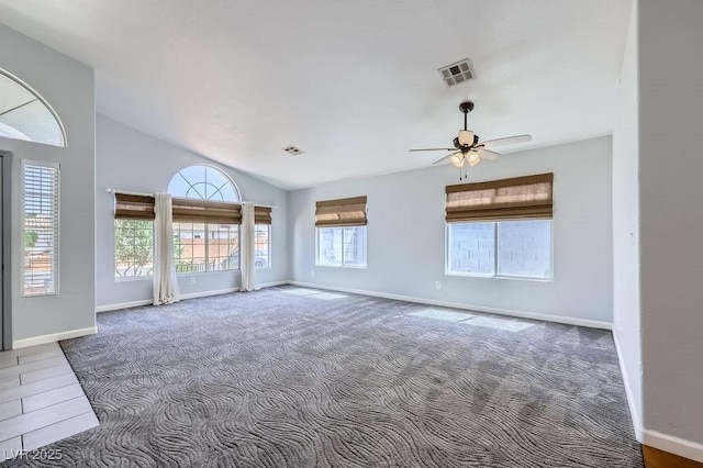 8309 Windrush Ave, Las Vegas, NV 89117 - carpeted empty room featuring a ceiling fan and lofted ceiling