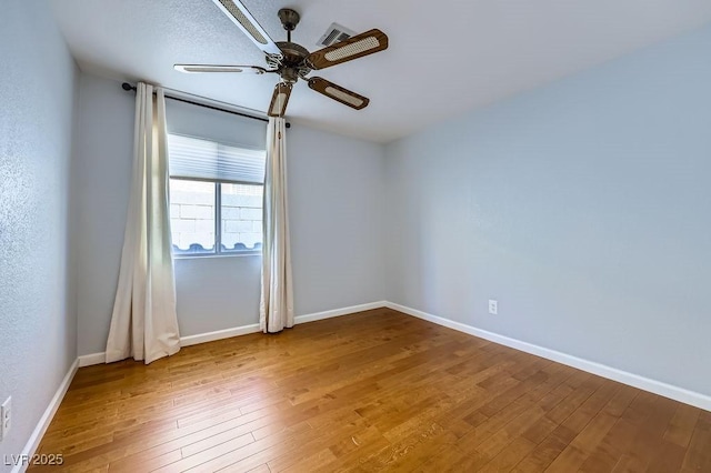 8309 Windrush Ave, Las Vegas, NV 89117 - unfurnished room featuring hardwood / wood-style flooring and ceiling fan