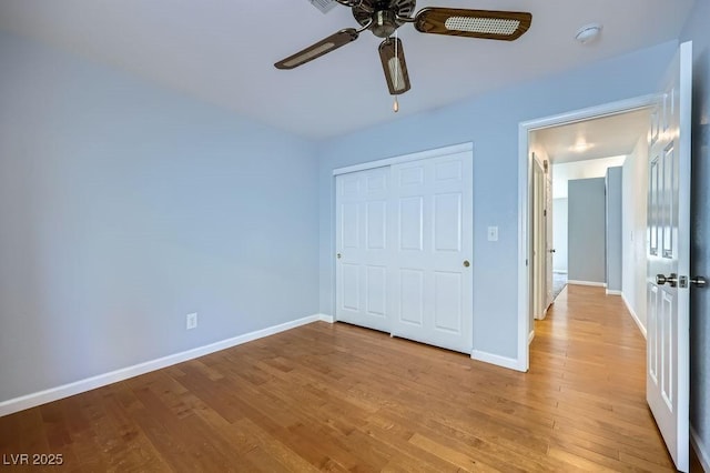 8309 Windrush Ave, Las Vegas, NV 89117 - unfurnished bedroom featuring wood finished floors, a closet, and ceiling fan