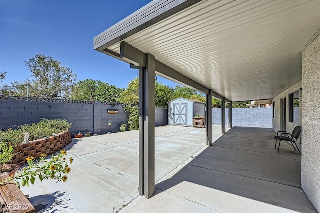 8309 Windrush Ave, Las Vegas, NV 89117 - fenced backyard with a storage shed and a patio area