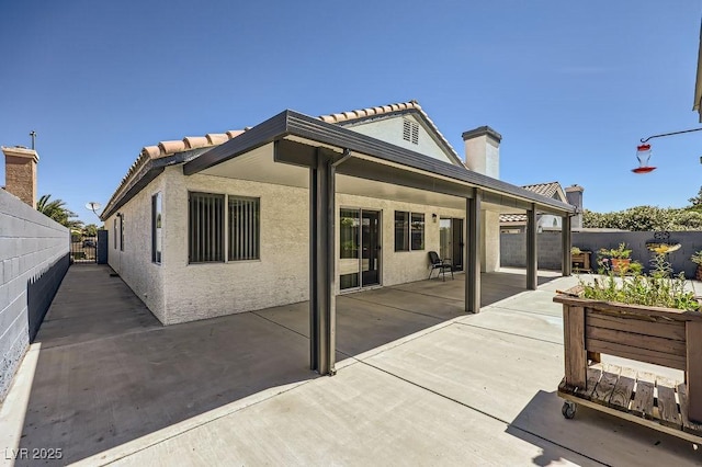8309 Windrush Ave, Las Vegas, NV 89117 - fenced backyard featuring a patio