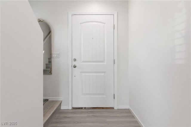 4976 Quiet Morning St, Las Vegas, NV 89122 - entryway with light wood-style flooring and baseboards