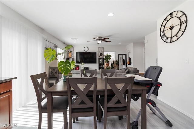 4976 Quiet Morning St, Las Vegas, NV 89122 - dining room with ceiling fan, light wood finished floors, and recessed lighting
