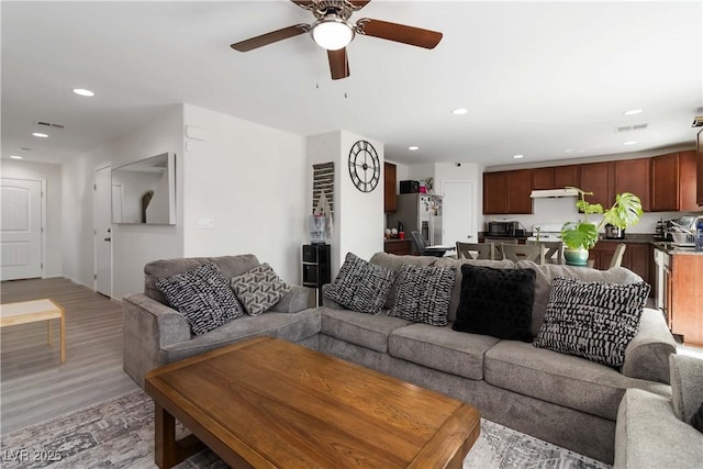 4976 Quiet Morning St, Las Vegas, NV 89122 - living area with a ceiling fan, recessed lighting, and light wood-type flooring