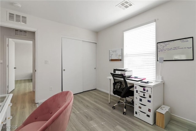 4976 Quiet Morning St, Las Vegas, NV 89122 - office space featuring plenty of natural light and light wood-style flooring