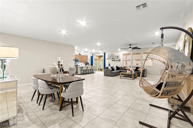 7502 Lush Oasis Ave, Las Vegas, NV 89113 - dining room featuring light tile patterned flooring, recessed lighting, and a ceiling fan