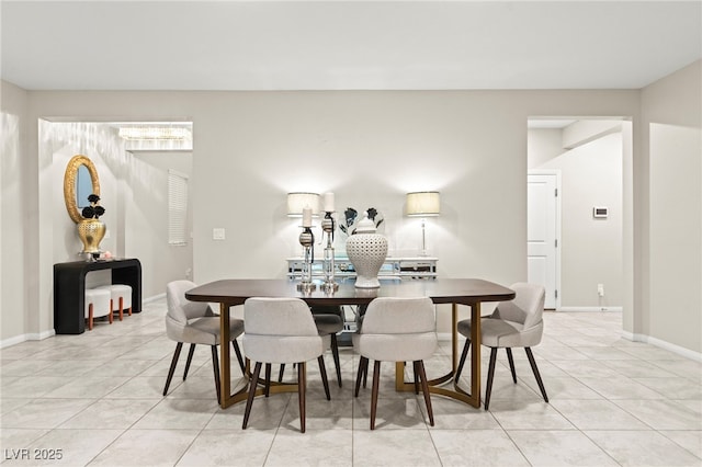 7502 Lush Oasis Ave, Las Vegas, NV 89113 - dining room featuring light tile patterned floors and baseboards