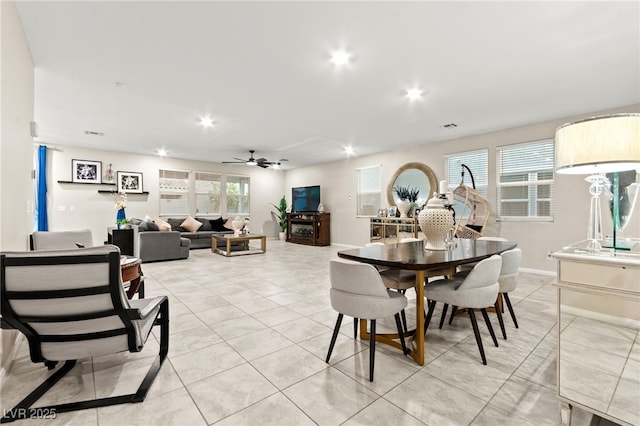 7502 Lush Oasis Ave, Las Vegas, NV 89113 - dining room featuring ceiling fan, recessed lighting, plenty of natural light, and light tile patterned floors