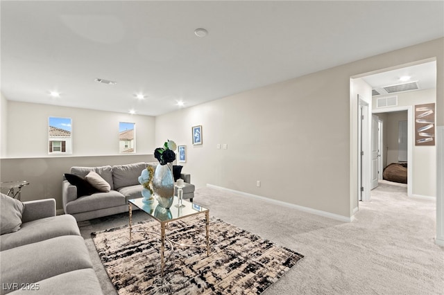 7502 Lush Oasis Ave, Las Vegas, NV 89113 - living room featuring light colored carpet and recessed lighting