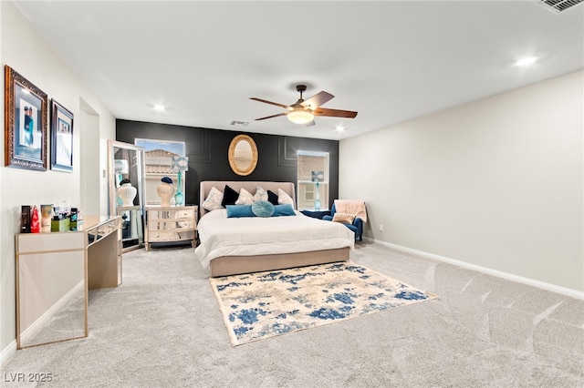 7502 Lush Oasis Ave, Las Vegas, NV 89113 - bedroom with light colored carpet, ceiling fan, and recessed lighting