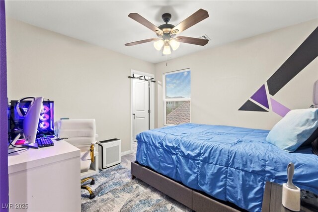 7502 Lush Oasis Ave, Las Vegas, NV 89113 - carpeted bedroom with a ceiling fan and baseboards