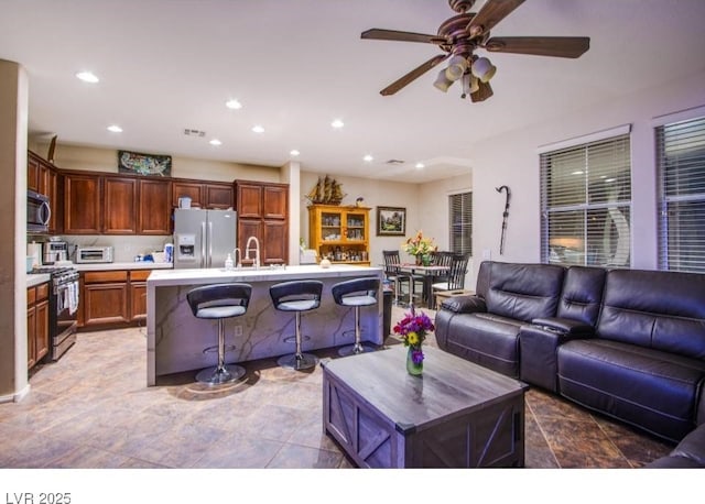1557 Blue Sierra Ct, Henderson, NV 89074 - living room with recessed lighting and a ceiling fan