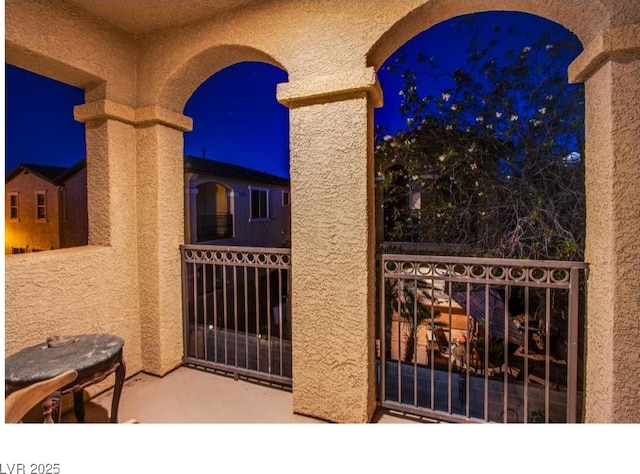 1557 Blue Sierra Ct, Henderson, NV 89074 - patio at twilight with a balcony