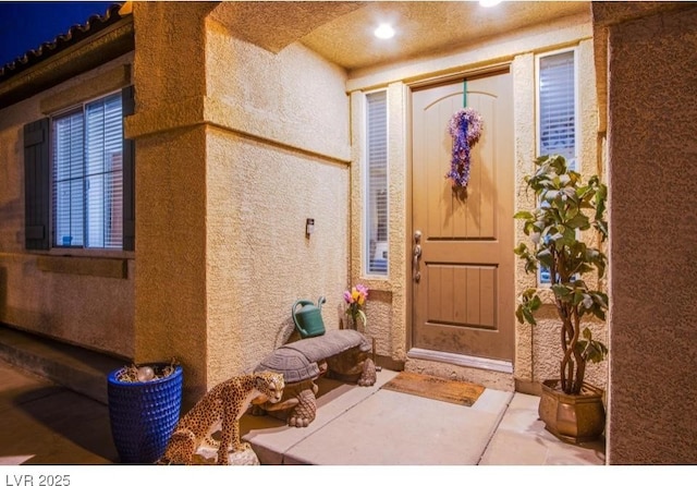 1557 Blue Sierra Ct, Henderson, NV 89074 - view of exterior entry with stucco siding