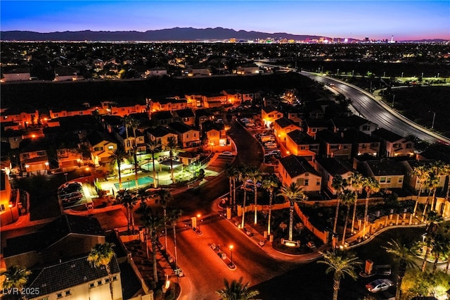 1557 Blue Sierra Ct, Henderson, NV 89074 - aerial view at dusk of a mountain view