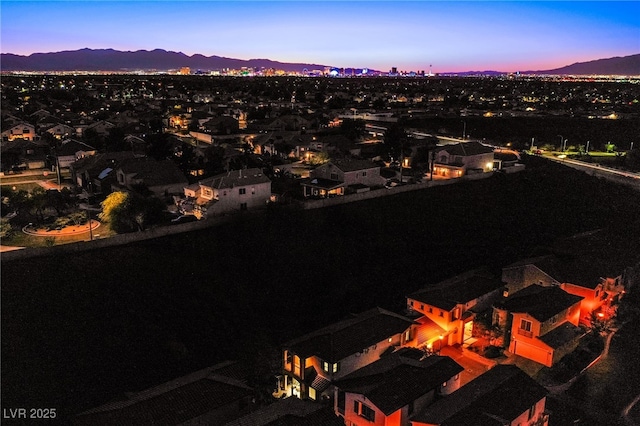 1557 Blue Sierra Ct, Henderson, NV 89074 - aerial view at dusk of a mountain view