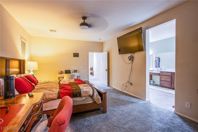 1557 Blue Sierra Ct, Henderson, NV 89074 - bedroom featuring carpet floors, ensuite bathroom, and ceiling fan