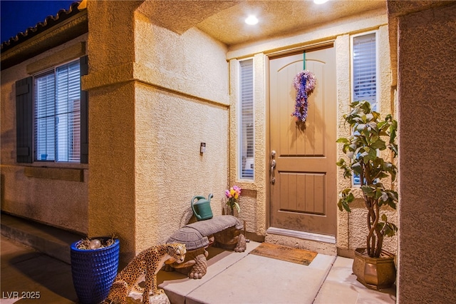 1557 Blue Sierra Ct, Henderson, NV 89074 - view of exterior entry with stucco siding