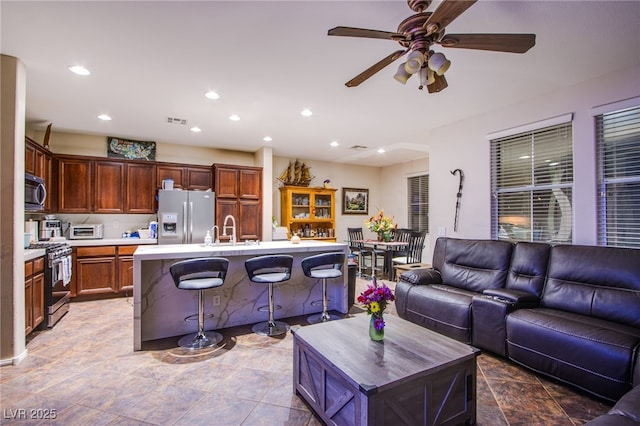 1557 Blue Sierra Ct, Henderson, NV 89074 - living area featuring recessed lighting and a ceiling fan