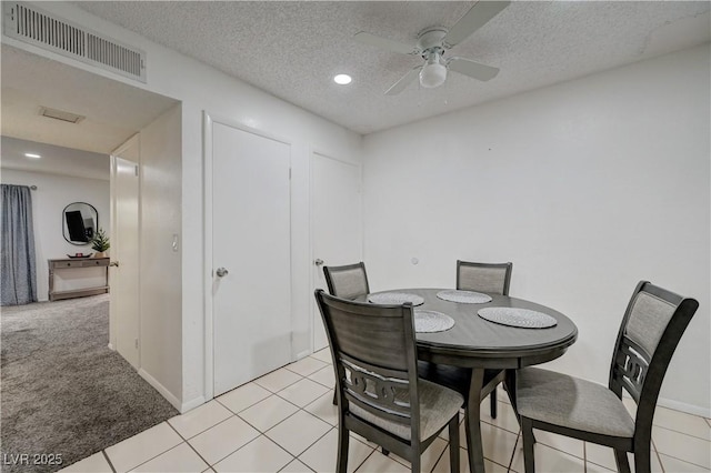 7066 Burcot Ave Unit 59, Las Vegas, NV 89156 - dining space featuring a ceiling fan, a textured ceiling, light colored carpet, and recessed lighting