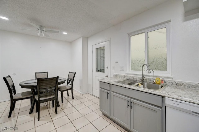 7066 Burcot Ave Unit 59, Las Vegas, NV 89156 - kitchen featuring dishwasher, gray cabinetry, ceiling fan, a textured ceiling, and recessed lighting