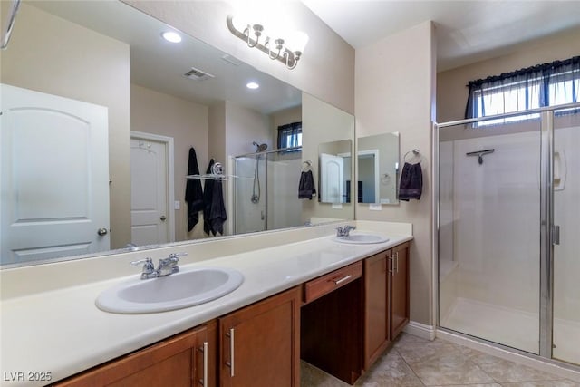 7652 Silver Baron Rd, Las Vegas, NV 89179 - bathroom with a shower stall, double vanity, and tile patterned floors
