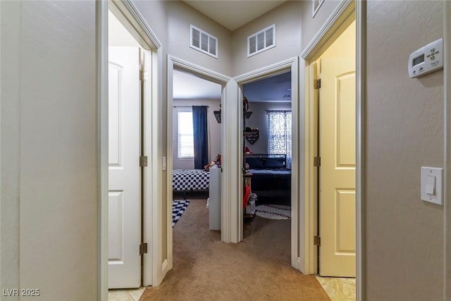 7652 Silver Baron Rd, Las Vegas, NV 89179 - corridor with light carpet