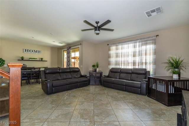 7652 Silver Baron Rd, Las Vegas, NV 89179 - living room featuring ceiling fan and light tile patterned floors