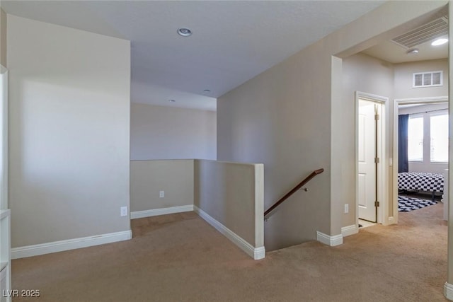 7652 Silver Baron Rd, Las Vegas, NV 89179 - hallway with an upstairs landing, carpet floors, and recessed lighting