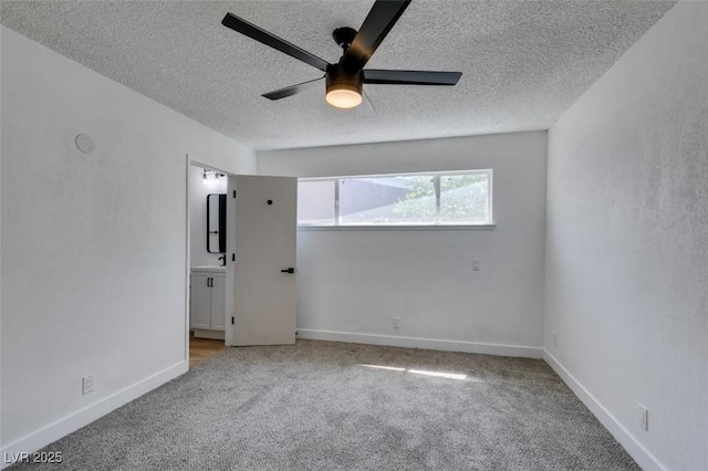 212 View Dr, Las Vegas, NV 89107 - carpeted empty room with a textured ceiling and ceiling fan