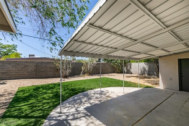 212 View Dr, Las Vegas, NV 89107 - fenced backyard with a patio area