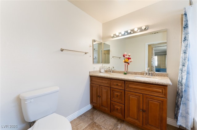 309 Clifton Heights Dr, Las Vegas, NV 89145 - full bathroom with toilet and double vanity