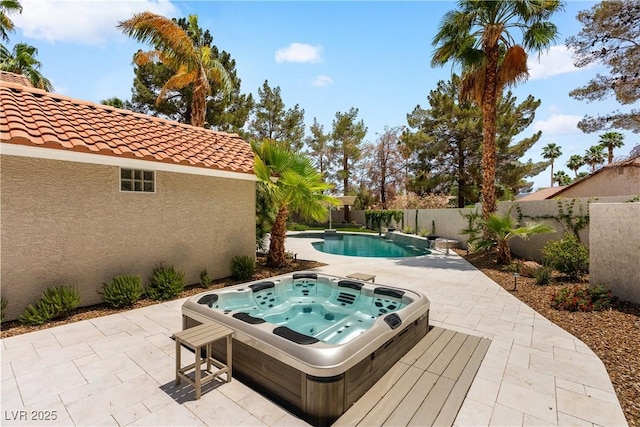 1990 Freeman Ct, Henderson, NV 89014 - view of swimming pool featuring an outdoor hot tub, a patio area, and a fenced backyard