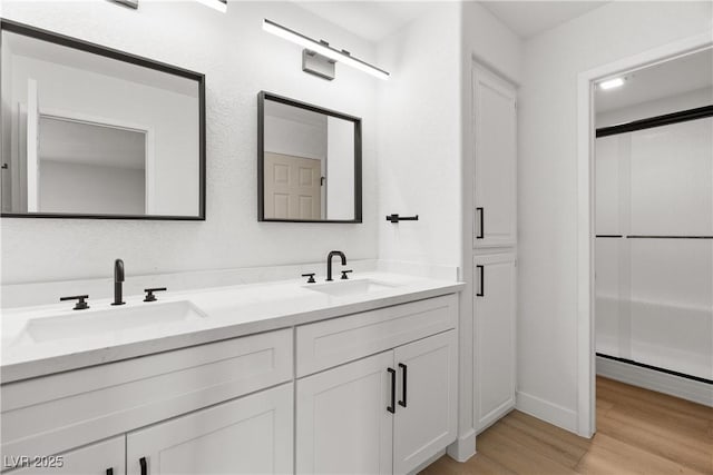 1990 Freeman Ct, Henderson, NV 89014 - bathroom with wood finished floors and double vanity