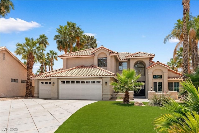 1990 Freeman Ct, Henderson, NV 89014 - mediterranean / spanish home with stucco siding, an attached garage, concrete driveway, a front yard, and a tiled roof