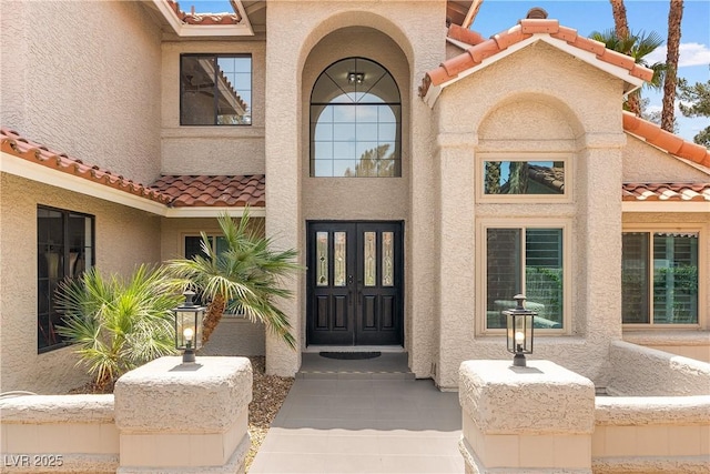 1990 Freeman Ct, Henderson, NV 89014 - view of exterior entry with a tile roof and stucco siding