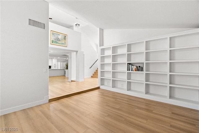 1990 Freeman Ct, Henderson, NV 89014 - unfurnished room with stairway, wood finished floors, and high vaulted ceiling