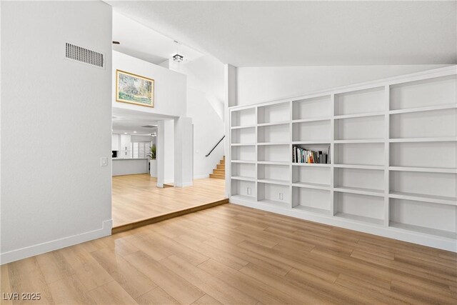 1990 Freeman Ct, Henderson, NV 89014 - spare room featuring stairway, wood finished floors, and high vaulted ceiling