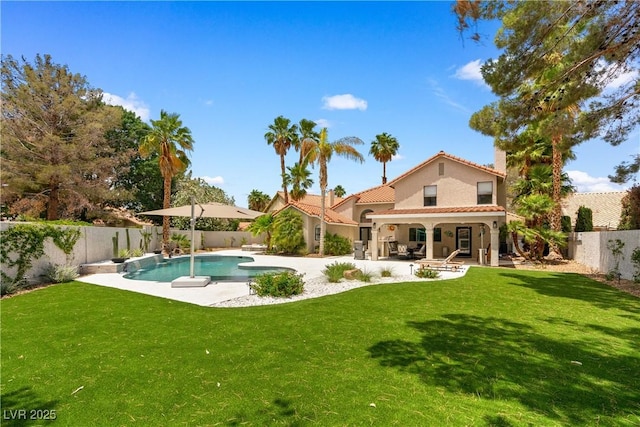 1990 Freeman Ct, Henderson, NV 89014 - back of house featuring a patio, a fenced backyard, a tile roof, and stucco siding