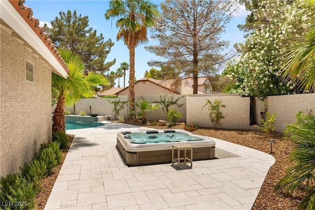 1990 Freeman Ct, Henderson, NV 89014 - fenced backyard with an outdoor hot tub and a patio