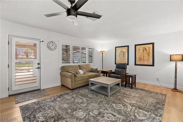 1990 Freeman Ct, Henderson, NV 89014 - living area with ceiling fan, a textured ceiling, and wood finished floors