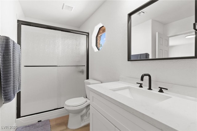 1990 Freeman Ct, Henderson, NV 89014 - bathroom with vanity, a stall shower, and wood finished floors