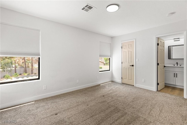 1990 Freeman Ct, Henderson, NV 89014 - unfurnished bedroom with light carpet and ensuite bathroom