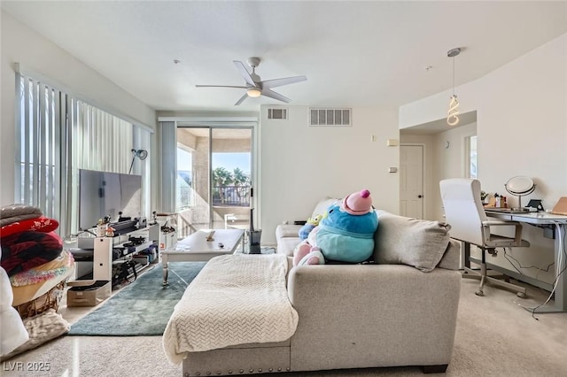 7127 S Durango Dr Unit 310, Las Vegas, NV 89113 - living room featuring a ceiling fan, an office area, plenty of natural light, and light colored carpet