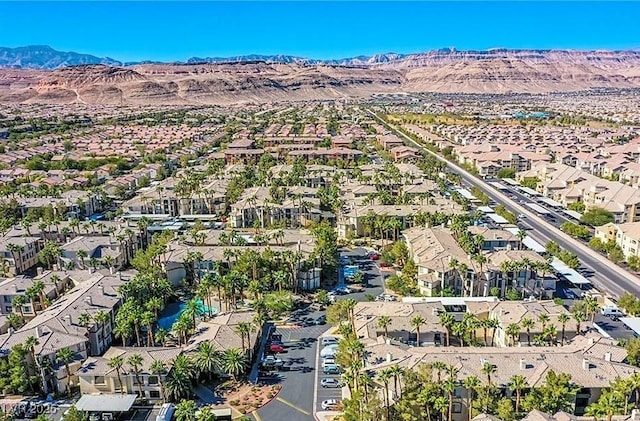 7127 S Durango Dr Unit 310, Las Vegas, NV 89113 - aerial perspective of suburban area with a mountainous background