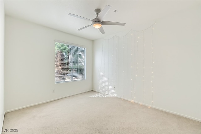 7127 S Durango Dr Unit 310, Las Vegas, NV 89113 - empty room featuring light carpet and a ceiling fan