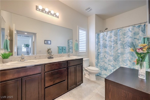7948 Eastern Elk St, Las Vegas, NV 89149 - bathroom featuring double vanity, a shower with shower curtain, and tile patterned flooring